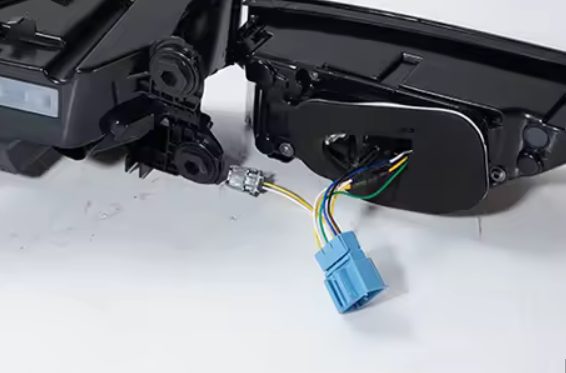 Euro tail light pigtail showing the blue connector and the small secondary connector before plugging in